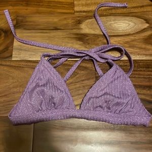 I am selling a purple glittery bikini, with ties on the side. It is size small.